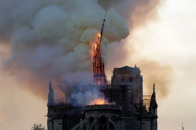 The spire collapsing