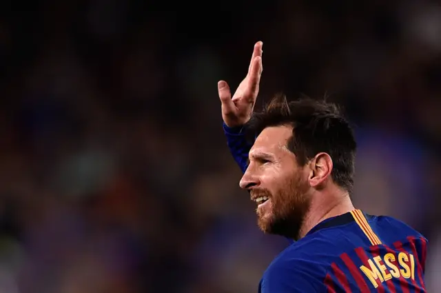 Lionel Messi salutes fans