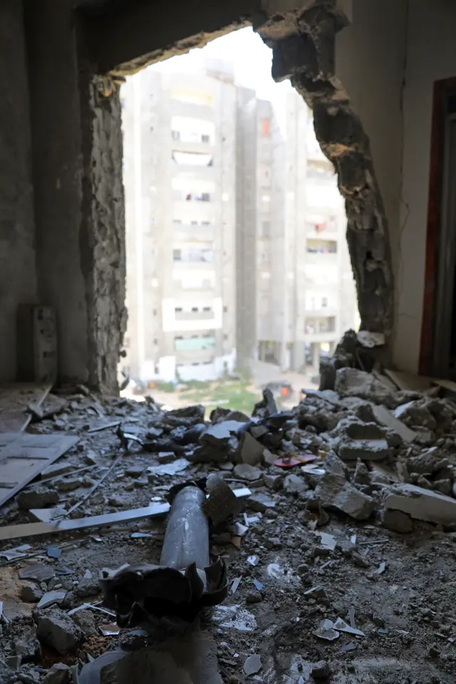 A hole in the wall of a house damaged by shelling during the fighting between the eastern forces and internationally recognized government is pictured in Abu Salim in Tripoli, Libya April 15, 2019.