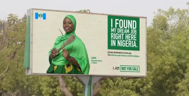 Handout photo issued by Department for International Development of one the posters used to encourage women in Nigeria to find jobs at home instead of risking a life of modern slavery in the UK.