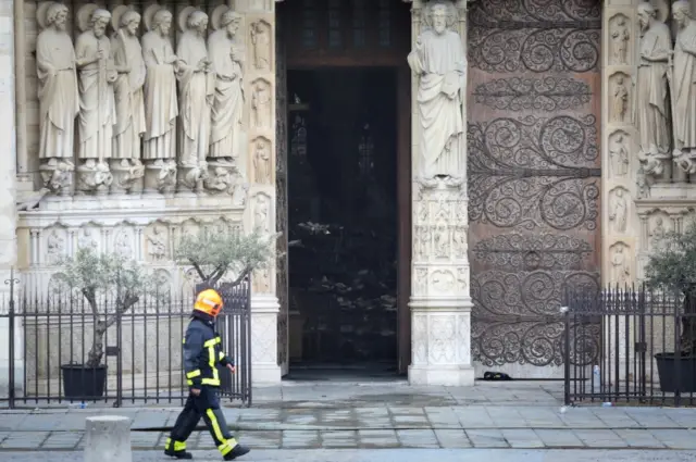 A firefighter outside Notre-Dame