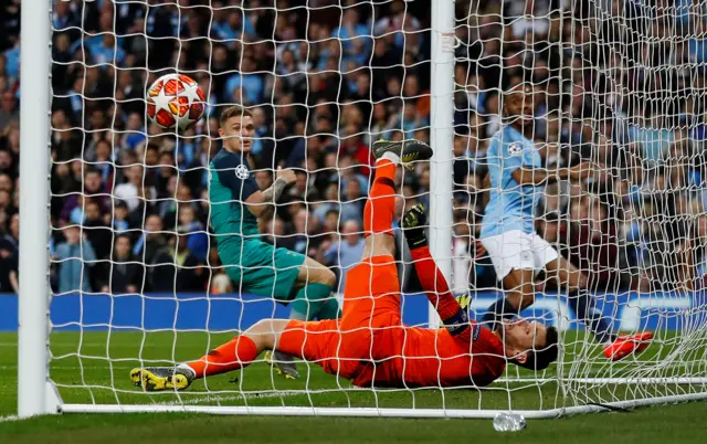 Hugo Lloris ends up in the net as Raheem Sterling fires in Man City's third goal from a tight angle