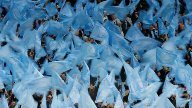 City fans waving flags