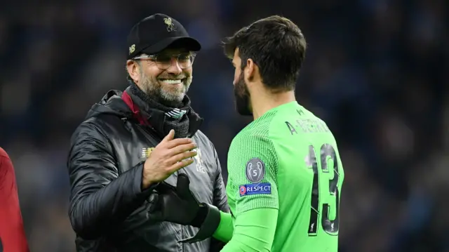 Jurgen Klopp and Liverpool goalkeeper Alisson Becker