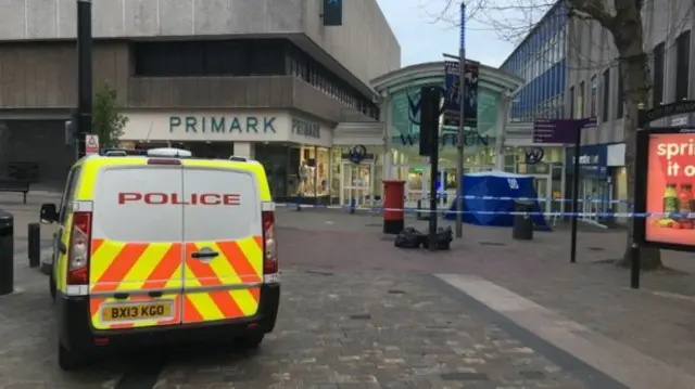 Police van and tent at the scene in Wulfrun Square