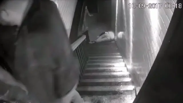 CCTV image of Bradley Aspin being thrown down the stairs at House of Smith by Jermaine Allen