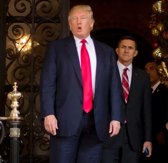 Trump and Flynn pictured together in 2016, months before taking officeg