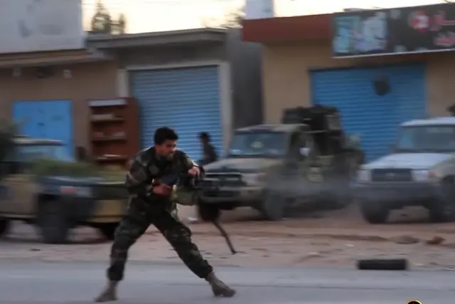 Fighter running with a machine gun