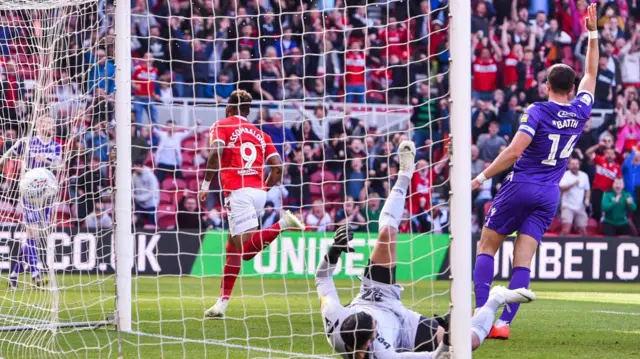 Britt Assombalonga scores