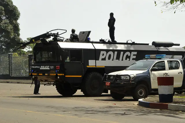 Police stand guard near the Supreme Court in Monrovia on November 3, 2017