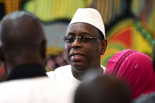 Senegal's President Macky Sall looks on during his first speech after the final results of his re-election were announced by the Constitutional Council on March 5, 2019, at the presidential palace in Dakar.