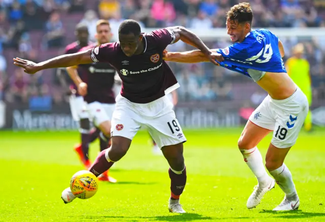 Hearts Uche Ikpeazu (left) and Nikola Katic in action