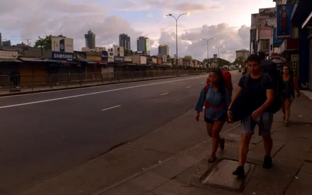 tourists on street after curfew