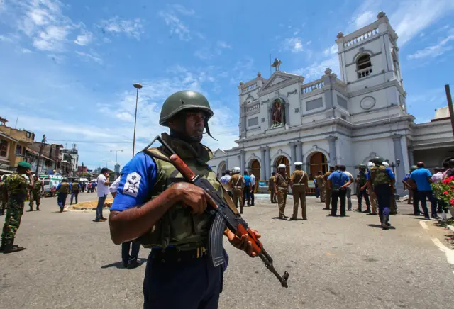 Sri Lankan security forces secure the area around St Anthony's Shrine