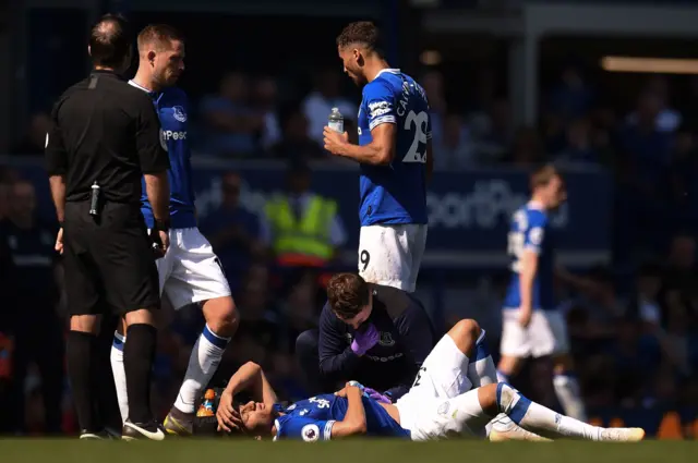 Richarlison lies injured