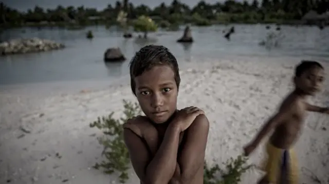 People who live on some Pacific islands are worried they will lose their homes to the sea if temperature rise exceeds 1.5C