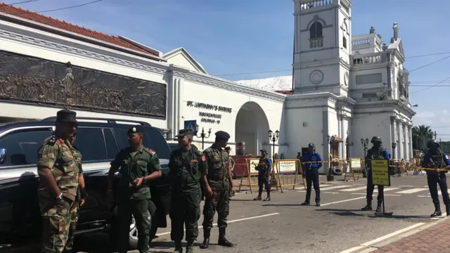 Armed police and security cordon outside St Anthony's church, Colombo