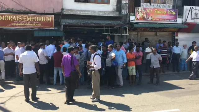 Crowds gather outside St Anthony's church, Colombo