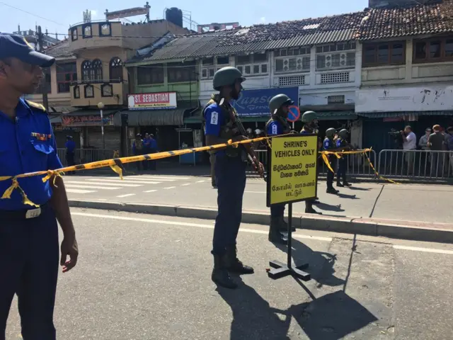 Armed police and security cordon outside St Anthony's church, Colombo