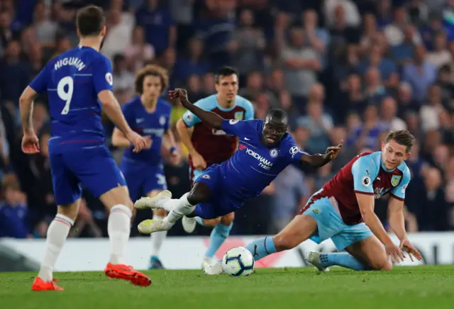 N'Golo Kante is tackled by James Tarkowski