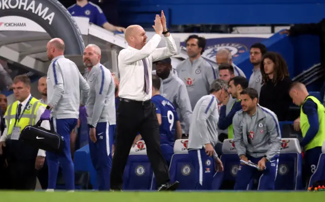 Sean Dyche applauds the Burnley fans at full time