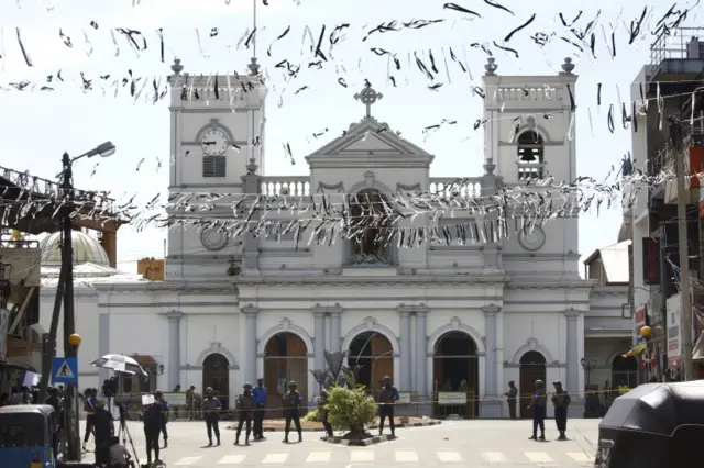 White bunting is seen in front of St Anthony's as the capital prepares for the funerals of the blast victims