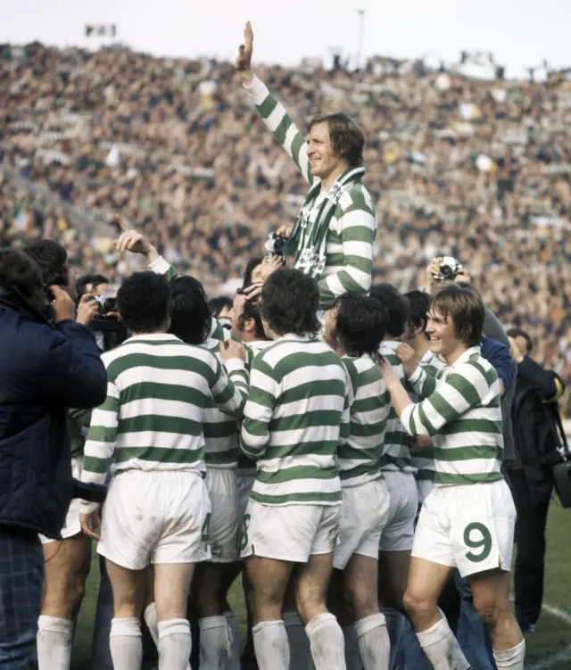 Billy McNeill celebrates with his team-mates after winning the Scottish Cup in his last match in 1975