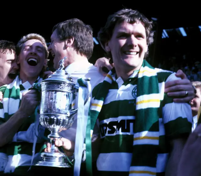 Celtic captain Roy Aitken celebrating with the Scottish Cup in 1988