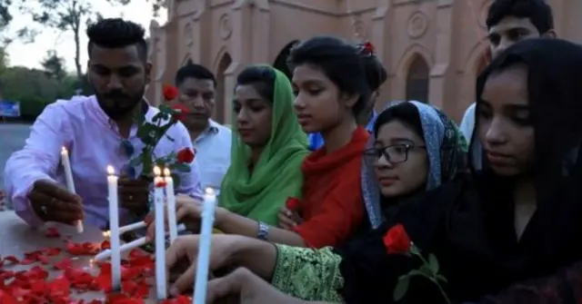 People paying respects