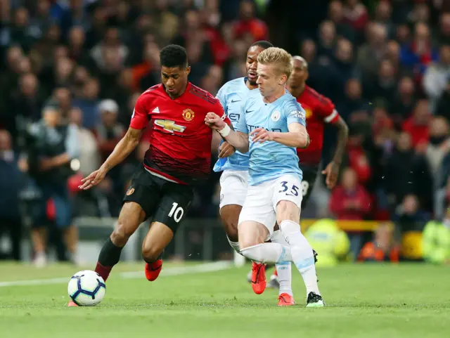 Oleksandr Zinchenko fouls Marcus Rashford