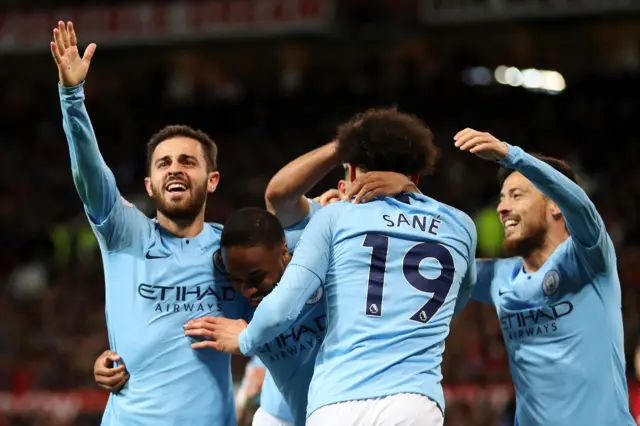 Man City players celebrate