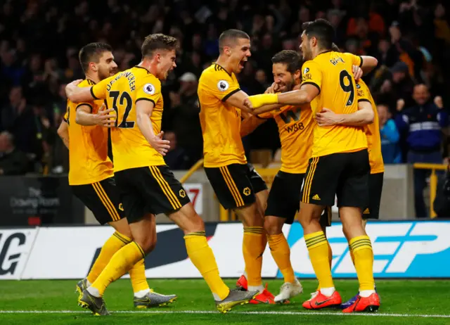 Wolves players celebrate