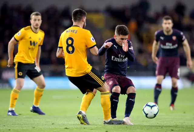 Lucas Torreira jumps in two-footed on Ruben Neves