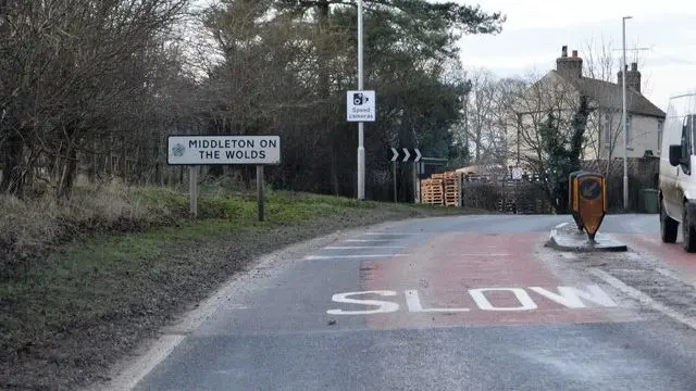 A sign saying Middleton on the Wolds