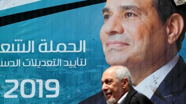 Poster with Egypt's leader