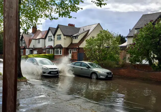 Main Road in Wilford flooded