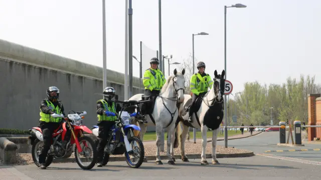 A police drone with mounted officers and the off-road bike team