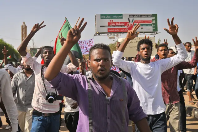 People demonstrating in Sudan