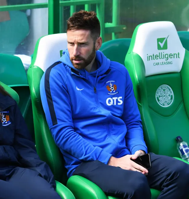 Kilmarnock defender Kirk Broadfoot sits in the dugout