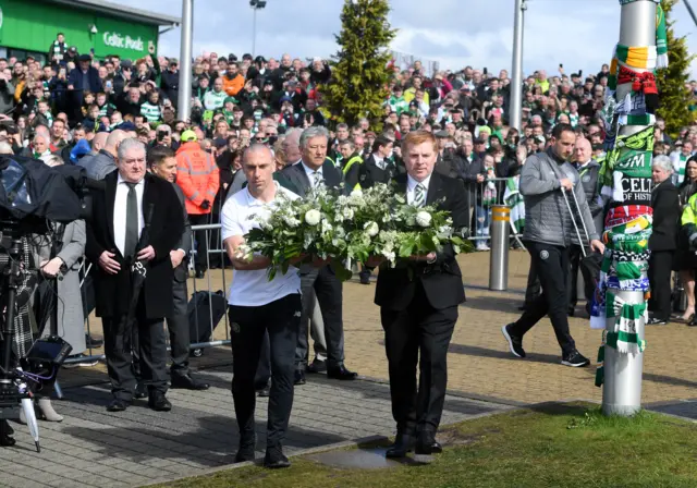 Celtic's Scott Brown and manager Neil Lennon lay their wreath