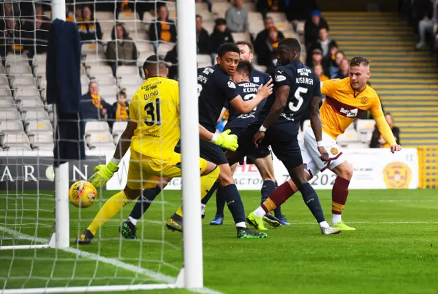 James Scott squeezes in his first senior goal for Motherwell