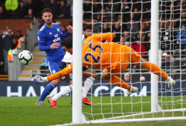 Sergio Rico makes a save