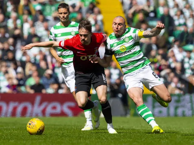 Celtic captain Scott Brown and Liam Millar vie for possession