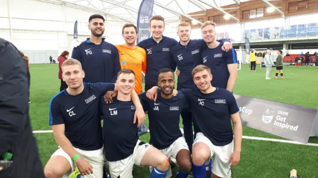 Team Best pose for a photo after winning the university male category at the FA People's Cup finals 2019