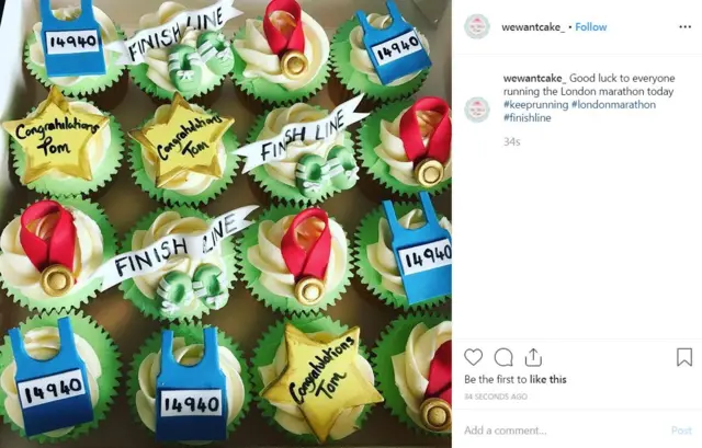 12 cupcakes with marathon themed decorations