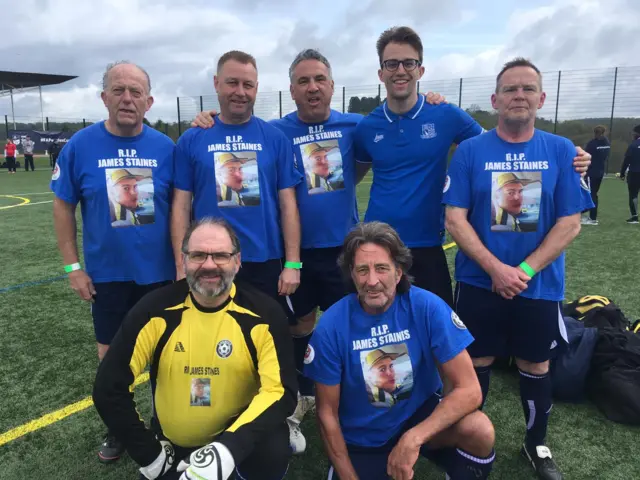 Dad Colin (top left) and brother Matthew (polo shirt and glasses) Staines from Chemico FC are wearing kits bearing a photo of James who trained with the team.