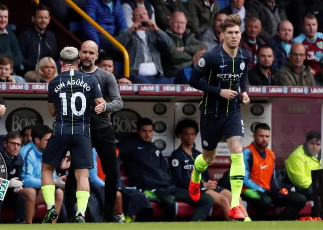 Sergio Aguero comes off for John Stones