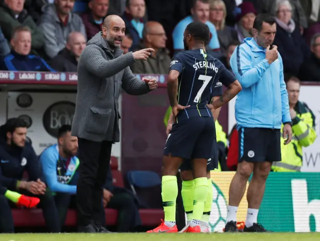 Pep Guardiola and Raheem Sterling