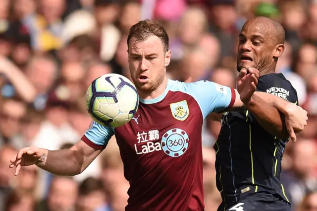 Ashley Barnes and Vincent Kompany