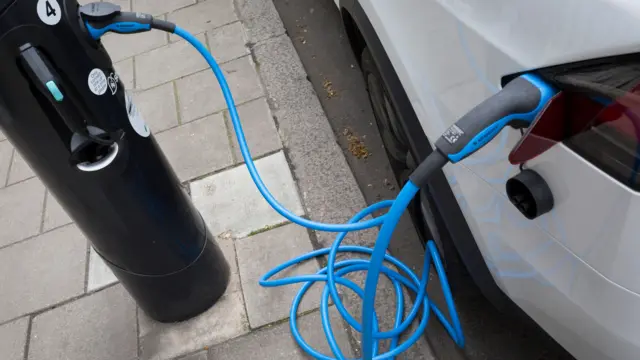 An electric car being charged